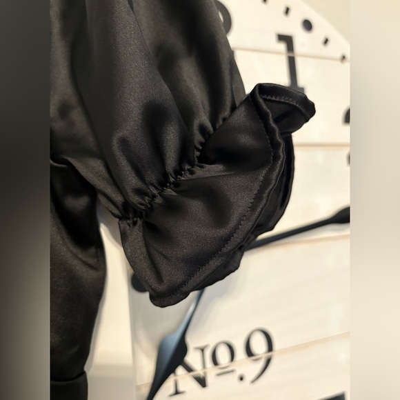 Lulu’s Black Satin Flared Pantsuit with ruffled shoulders - Picture 10 of 10